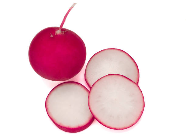 istock Fresh red sliced radish isolated on white background 1265161647