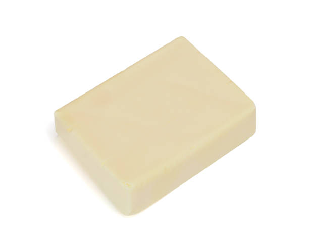 istock piece of butter isolated on white background 1265163836