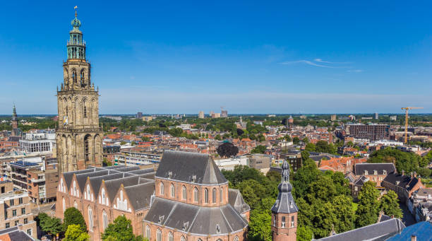 Historic Martini church tower dominating the skyline of Groningen stock photo