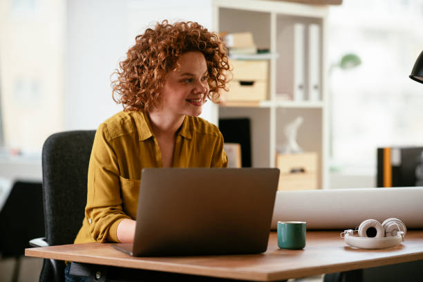 istock Young businesswoman working in the office 1265170348