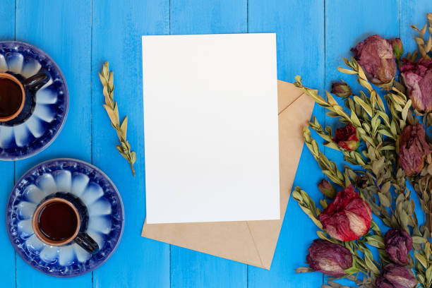 istock Blank Invitation on Wooden table with dried flowers 1265171677