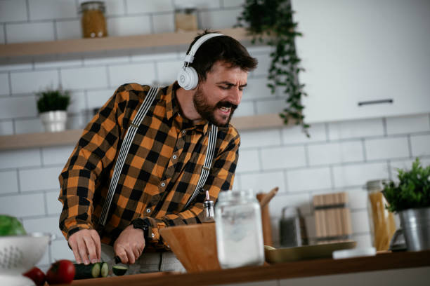 istock Young man preparing delicious food. 1265171742