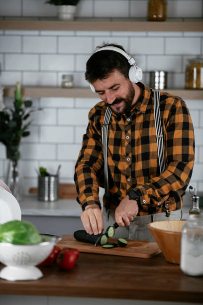 istock Young man preparing delicious food. 1265171767