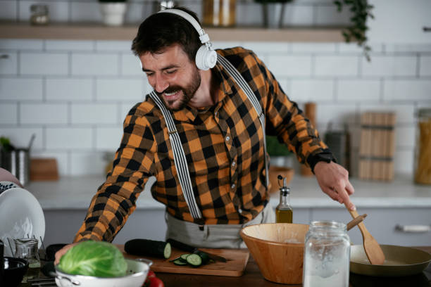 istock Young man preparing delicious food. 1265171774
