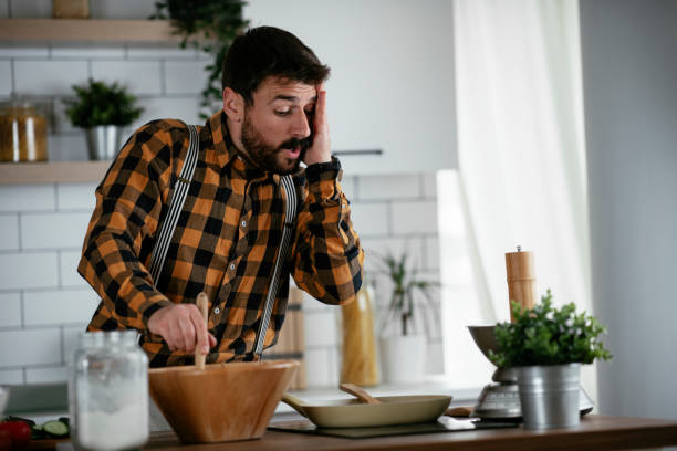 istock Young man preparing delicious food. 1265171831