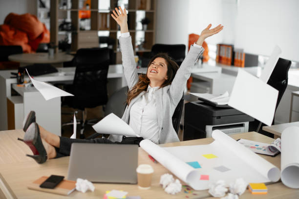 istock Beautiful woman working on project. 1265172658