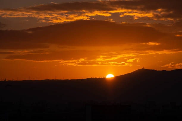 istock Beautiful sunrise and sunrise over the mountains 1265173106