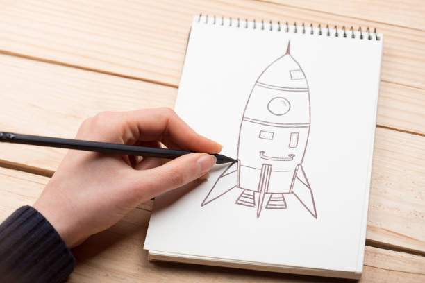 istock Artist drawing an anime comic book in a studio. 1265174719