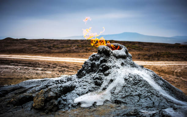 mud volcanoes of Gobustan Burning gas in the mud volcanoes of Gobustan, Azerbaijan azerbaijan stock pictures, royalty-free photos & images