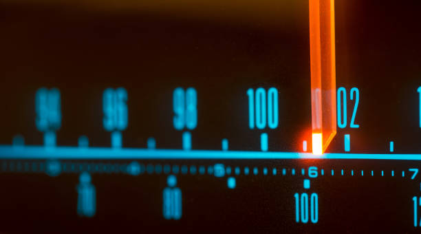 classic radio tuner panel close-up. black background - tuner imagens e fotografias de stock