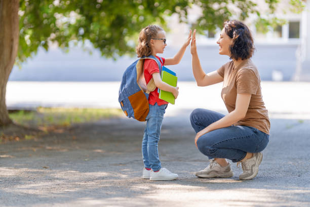 istock Parent and pupil go to school 1265175482