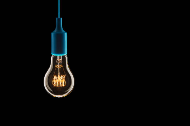 istock Idea and leadership concept - bulbs on the black background 1265176093
