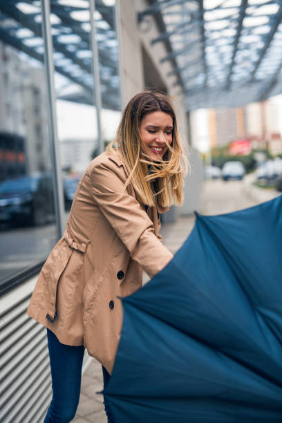 istock Smiling young women on a windy day 1265178351
