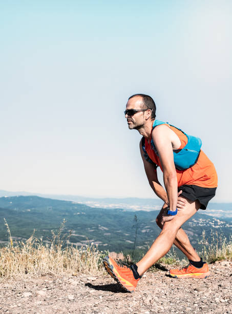 istock men runner warm up outdoor. 1265182627