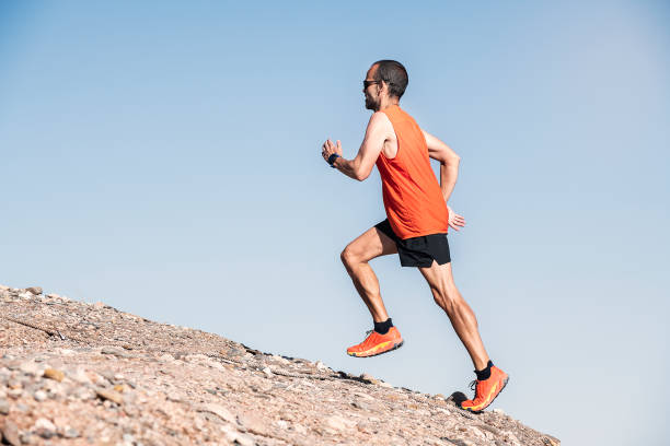 istock Athletic young man running in the nature. 1265182912