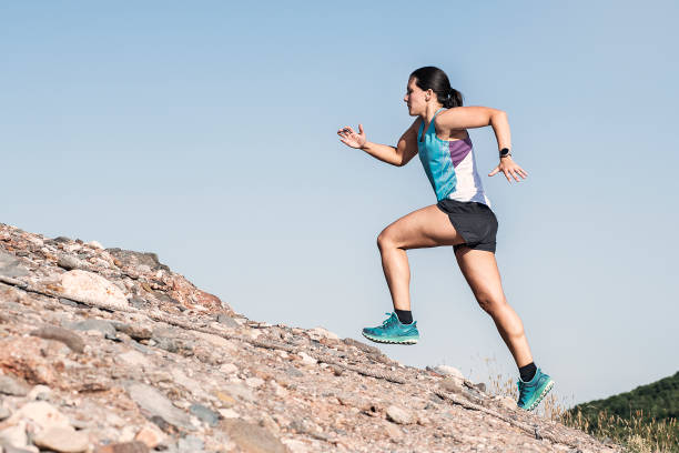 istock Woman running on mountain 1265183456
