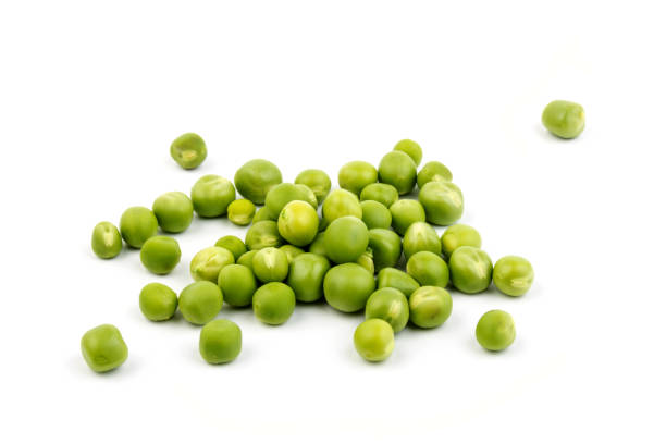 istock Green young peas, isolated on white background. Close-up. Top view 1265183883