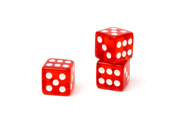 istock Transparent and red glass dices isolated on white background. 1265183952