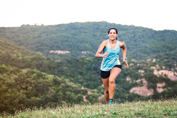 Woman running on mountain