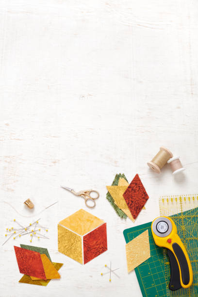 istock Accessories for quilting top view on a white surface. Space for text. 1265191023