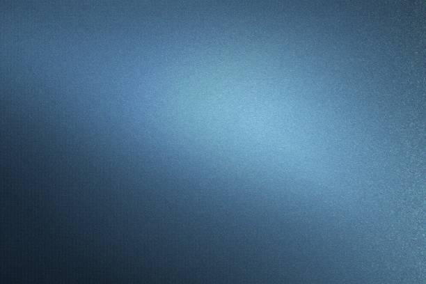 istock Glowing blue foil glitter metallic wall with copy space, abstract texture background 1265191963