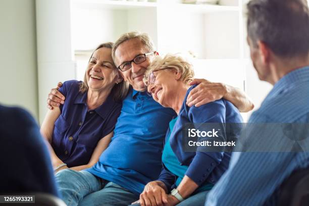 Cheerful Senior People During Group Therapy Stock Photo - Download Image Now - Group Therapy, Laughing, Patient