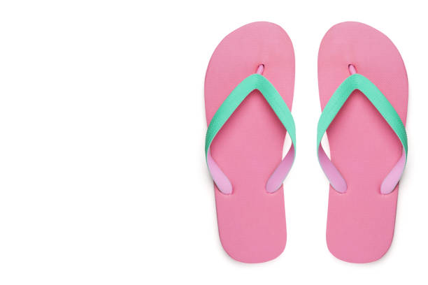 istock Pink flip flops or slippers isolated on white background 1265193485
