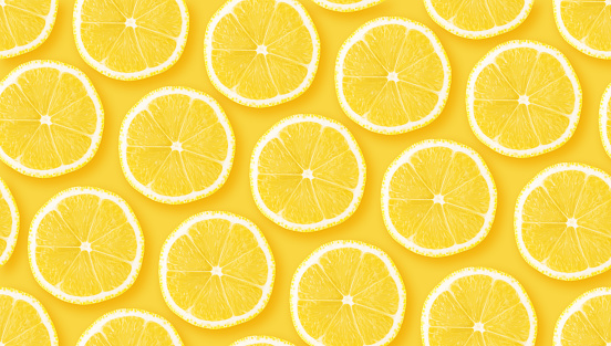 Lemon citrus slices seamless backdrop texture. Flat lay backdrop