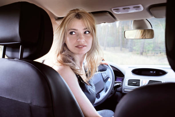 istock Woman driving car 1265196761