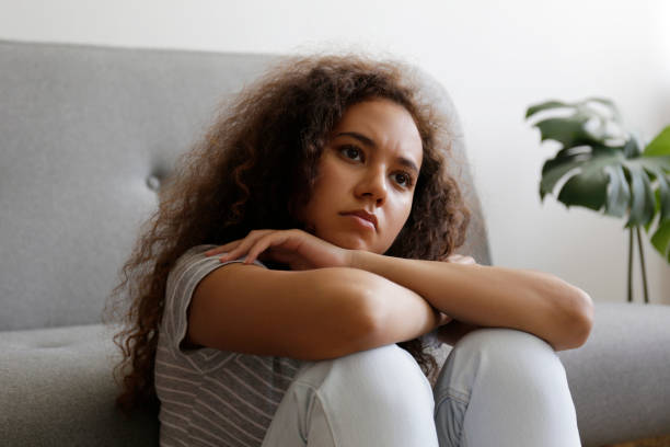 istock Sad lonely person at home 1265198115