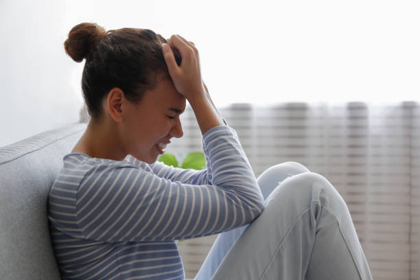istock Sad lonely person at home 1265198127