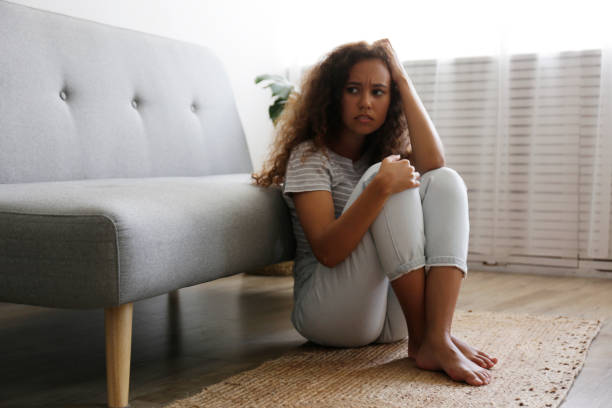 istock Sad lonely person at home 1265198172