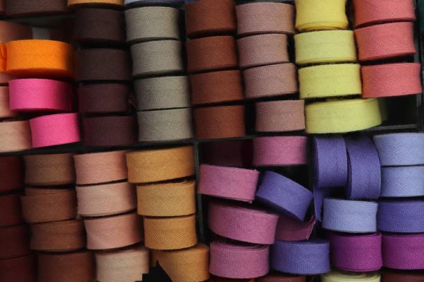 istock Detailed close up view on samples of cloth and fabrics in different colors found at a fabrics market 1265200623
