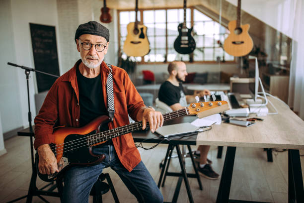 istock Senior musician posing in his studio office 1265201550