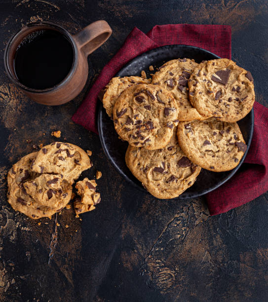 istock Chocolate Chip Cookies on a Wooden Table 1265202995