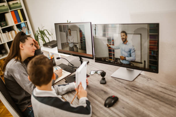 istock Boy and girl studies at home and doing school homework. Distance learning online education. 1265204342