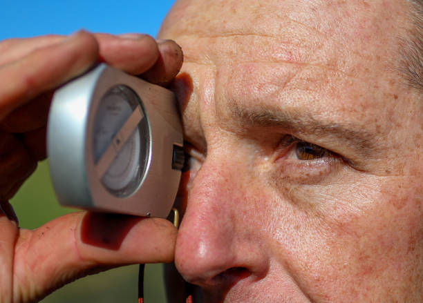 istock A man is using a clinometer while building a new mountain bike track. 1265204369
