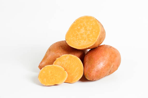 istock studio shot of orange sweet potatoes 1265204720