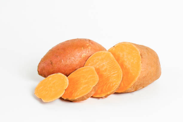 istock studio shot of orange sweet potatoes 1265204723