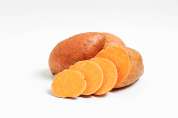 istock studio shot of orange sweet potatoes 1265204745