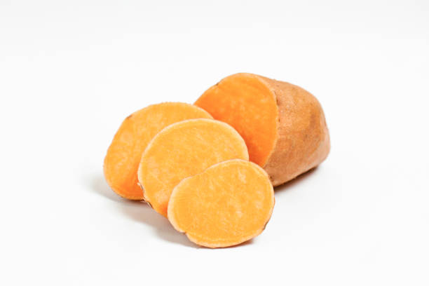 istock studio shot of orange sweet potatoes 1265204746
