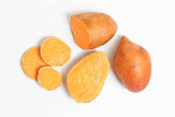 istock studio shot of orange sweet potatoes 1265204762