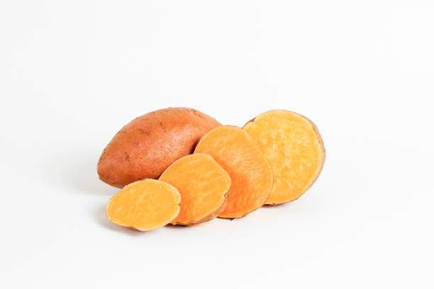 istock studio shot of orange sweet potatoes 1265204765