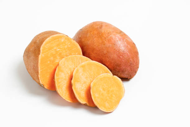 istock studio shot of orange sweet potatoes 1265204778