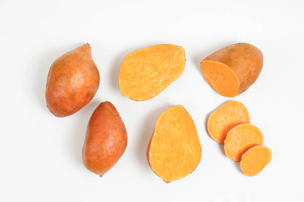 istock studio shot of orange sweet potatoes 1265204782
