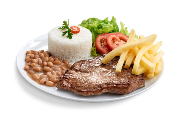 Alcatra steak executive dish with rice, beans, salad, fries Alcatra steak executive dish with rice, beans, salad, fries, view from below beans and rice stock pictures, royalty-free photos & images