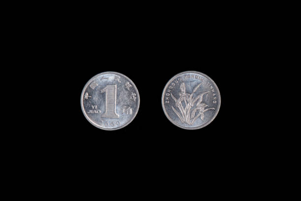 istock 1 Jiao coin China 2000 on a black background. close-up on two sides. on the reverse is a blooming orchid 1265206045