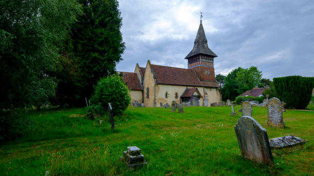 All Saints' Church in Steep near Petersfield in the South Downs National Park, Hampshire, UK Steep, UK - June 11, 2020:  All Saints' Church in the Hampshire village of Steep near Petersfield in the South Downs National Park, UK petersfield stock pictures, royalty-free photos & images