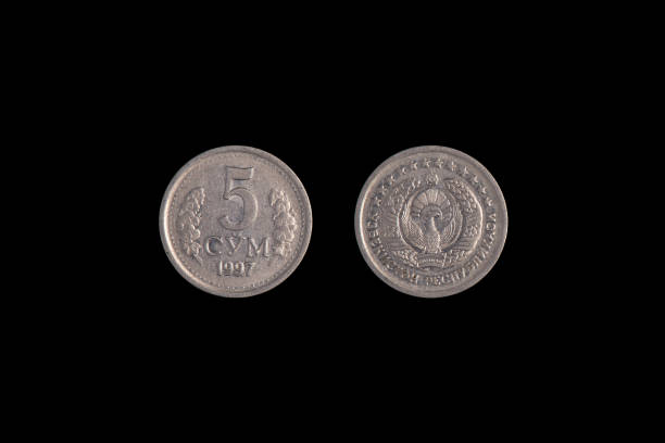 istock 5 Uzbek som coin 1997 on a black background. close-up on both sides 1265208441