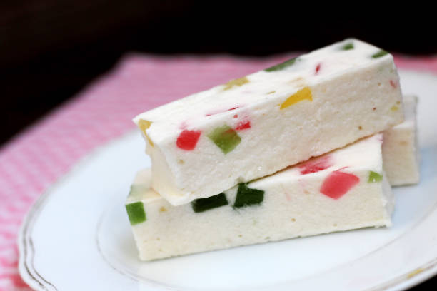 istock White marshmallow with marmalade crumbs, dessert 1265208606